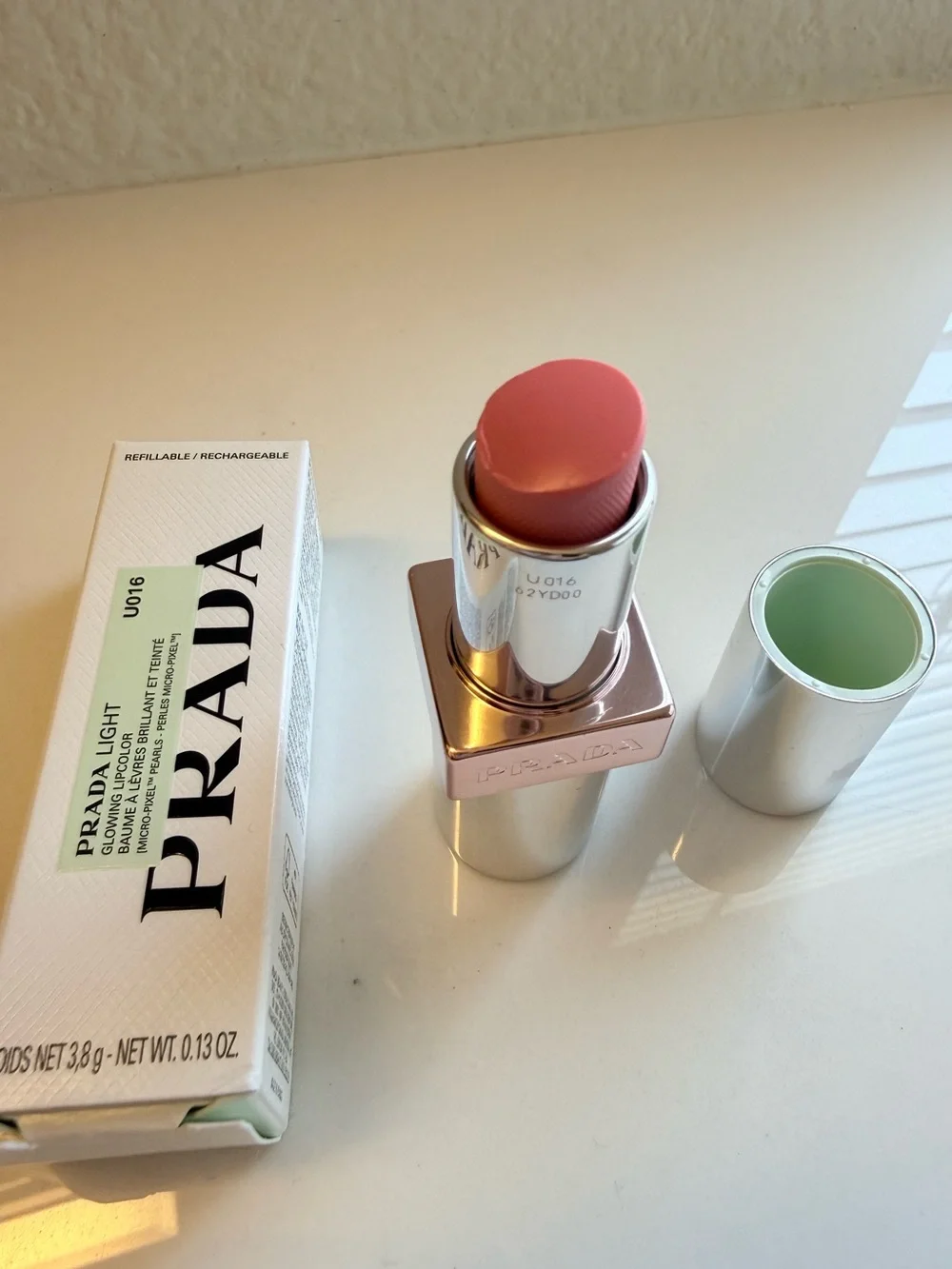 Prada Light Refillable Glowing Lip Oil Stick in Rose U016 Bubblegum Pink